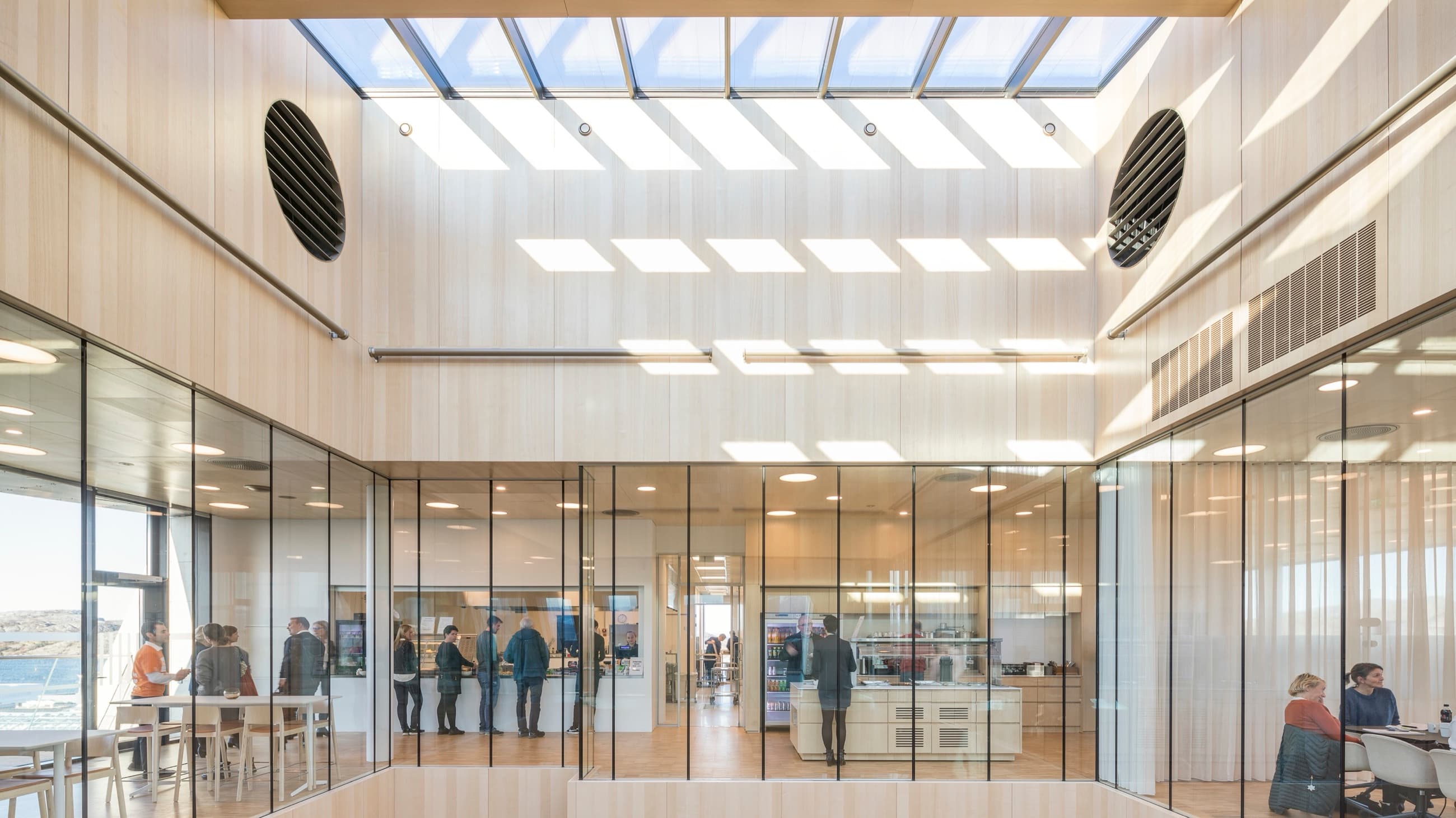 Timber-lined atrium with skylights at the new town hall in Bodo, Norway